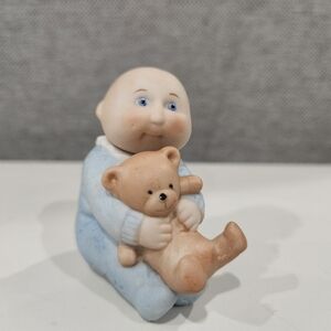 Adorable Blue Baby Figurine with Teddy Bear